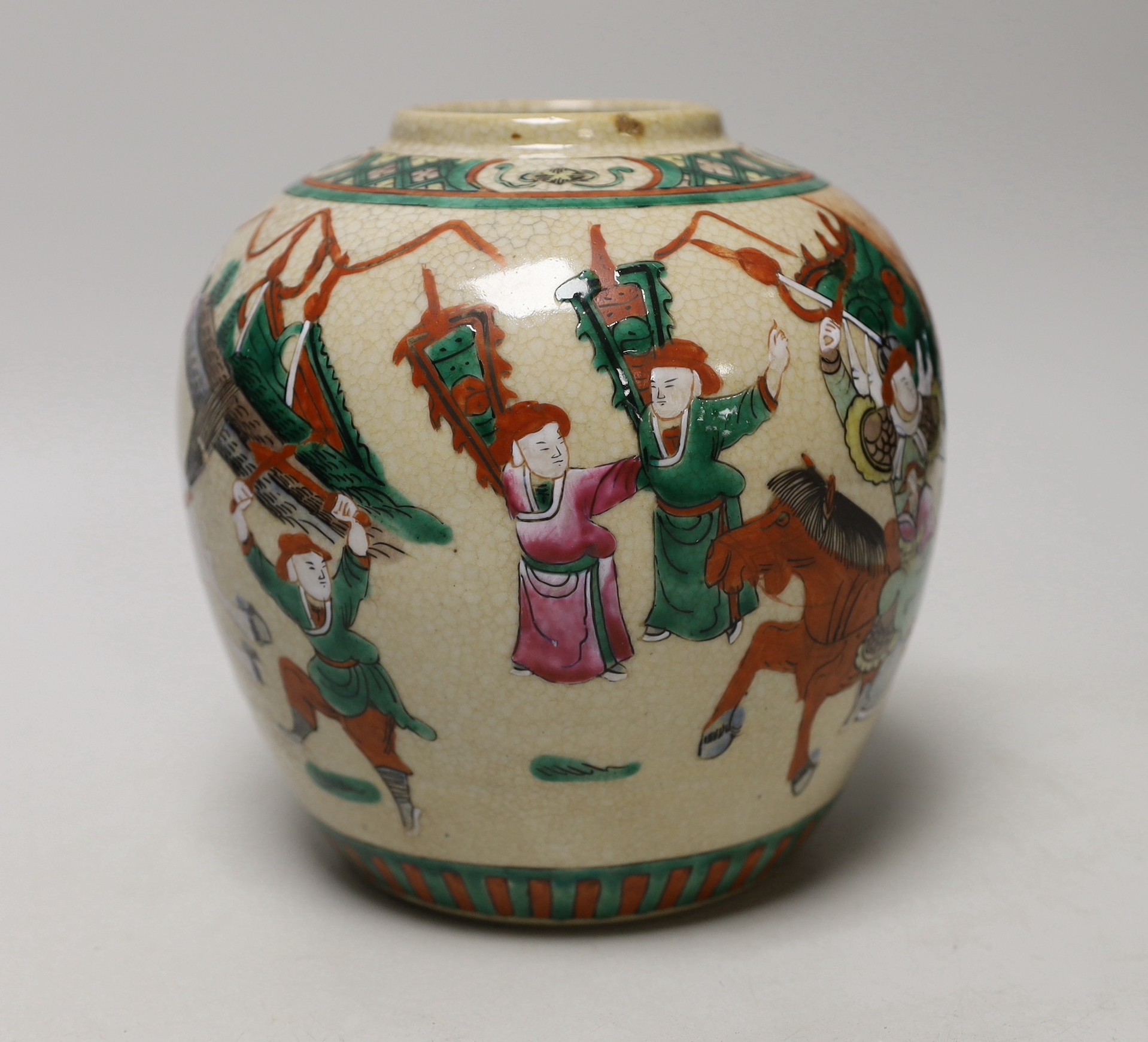 An early 20th century Chinese famille rose crackle glaze ginger jar, decorated with warrior scenes, 18cm high